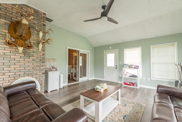 1216 Maple Hill Dr, Somerset, KY 42503 - living room with vaulted ceiling, a ceiling fan, wood finished floors, and baseboards