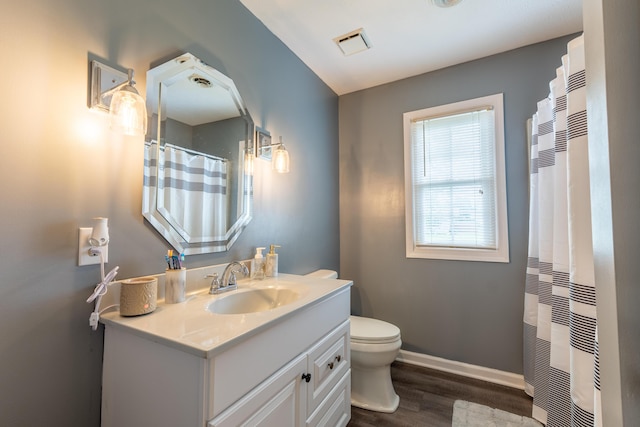 1216 Maple Hill Dr, Somerset, KY 42503 - bathroom featuring vanity, wood finished floors, toilet, baseboards, and a shower with curtain