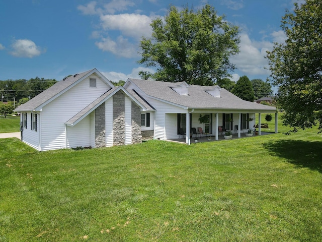 1216 Maple Hill Dr, Somerset, KY 42503 - back of property featuring a lawn, a patio area, stone siding, and a shingled roof