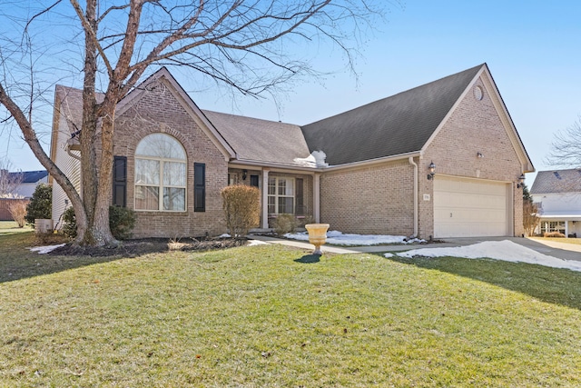 view of front of house featuring a garage and a front yard