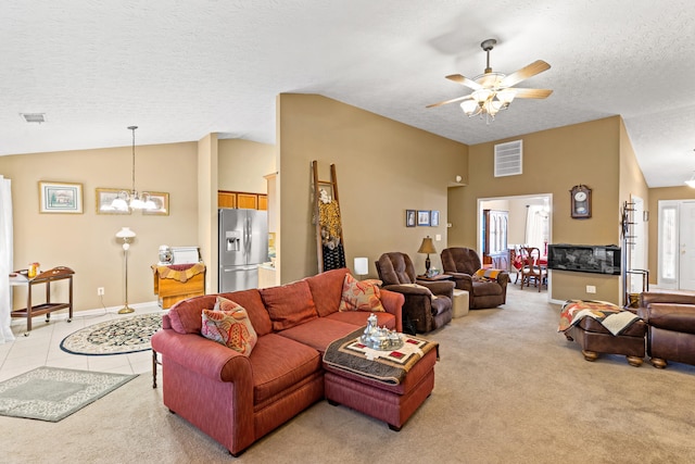 living room featuring vaulted ceiling, light colored carpet, and a textured ceiling