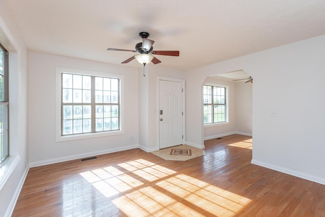 entrance foyer featuring ceiling fan and light hardwood / wood-style flooring