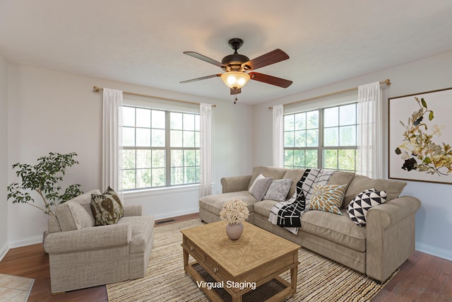 living room featuring ceiling fan, a wealth of natural light, and hardwood / wood-style flooring