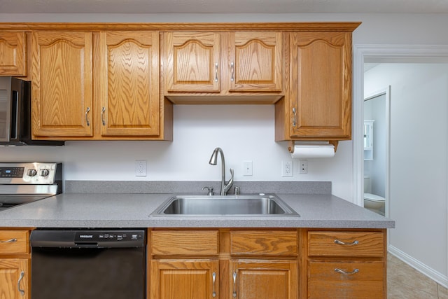 kitchen featuring light tile patterned flooring, black dishwasher, electric range, and sink