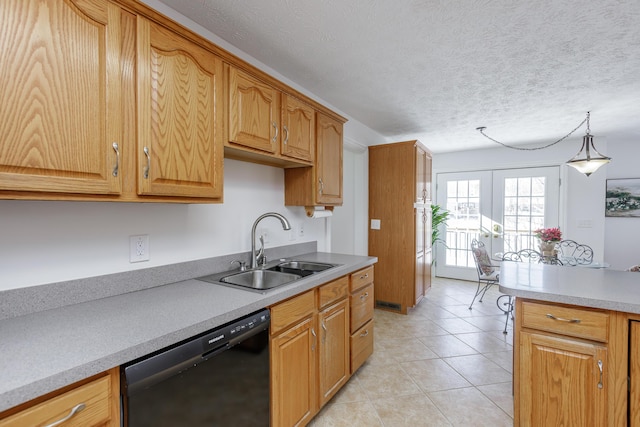 kitchen with decorative light fixtures, dishwasher, french doors, a textured ceiling, and sink