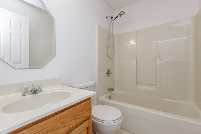 full bathroom featuring toilet, vanity, and tub / shower combination