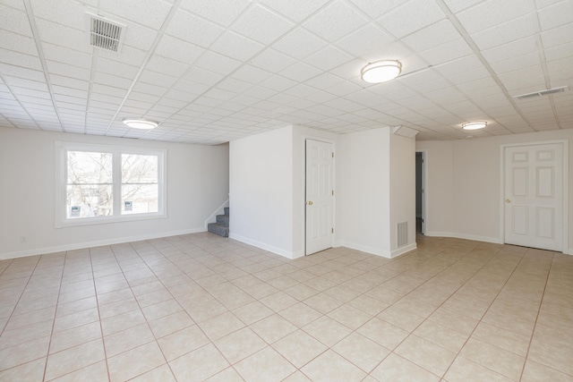 basement with a drop ceiling