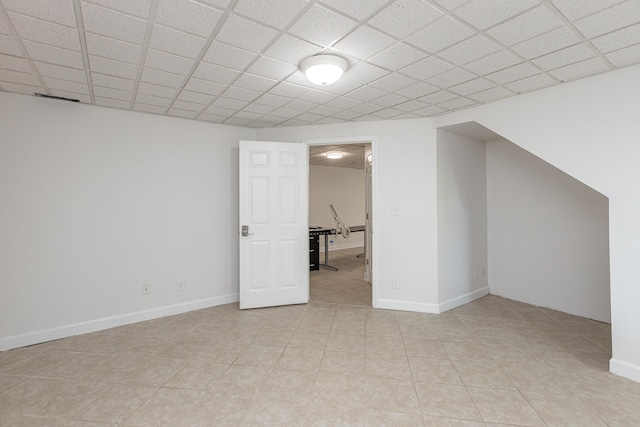 basement with a drop ceiling