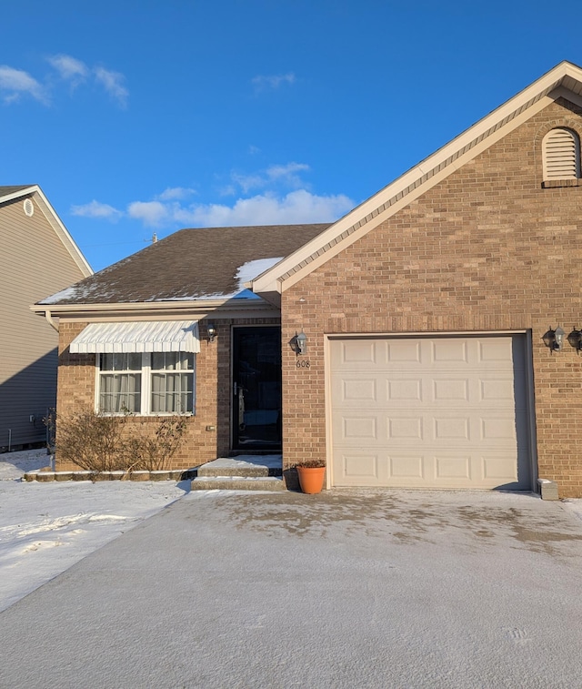 ranch-style home with a garage