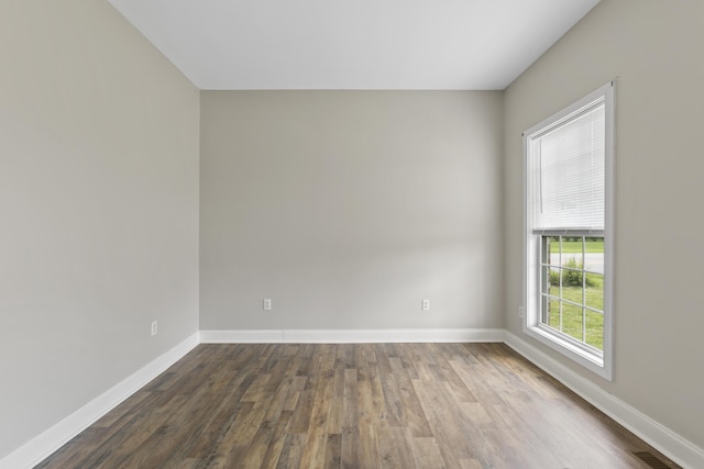 empty room featuring hardwood / wood-style flooring