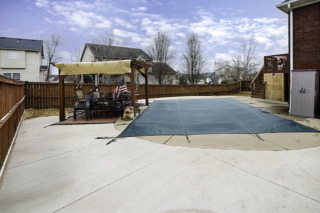 6028 Crabapple Rd, Versailles, KY 40383 - view of pool with stairway, a wooden deck, outdoor dining area, a fenced backyard, and a patio area