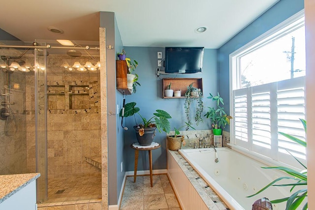 bathroom with shower with separate bathtub and tile patterned floors