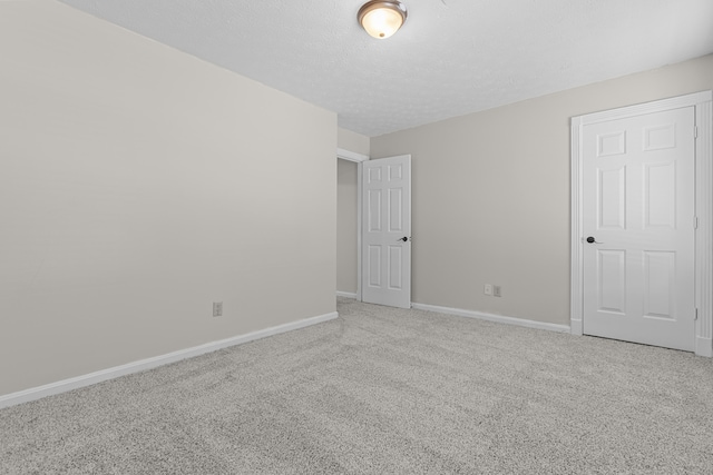 spare room with carpet