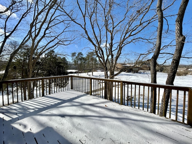 view of snow covered deck