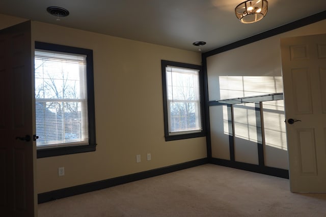 view of carpeted spare room