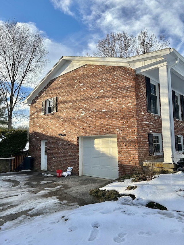 view of snow covered property