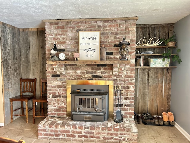 details featuring a textured ceiling, a fireplace, and wooden walls