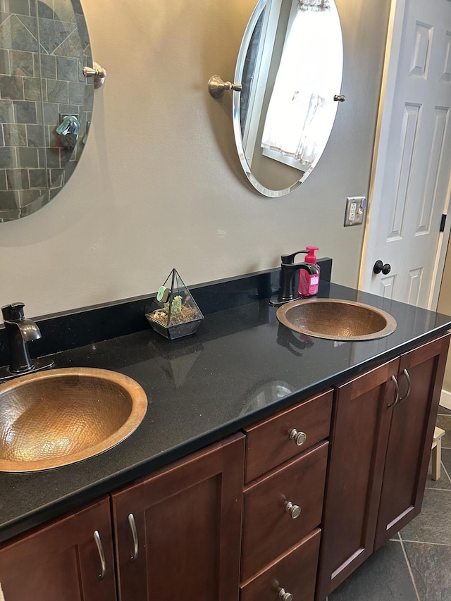 bathroom with vanity and tile patterned flooring