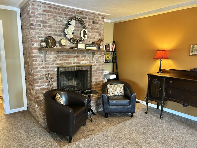 living area featuring a textured ceiling, a brick fireplace, crown molding, and carpet floors