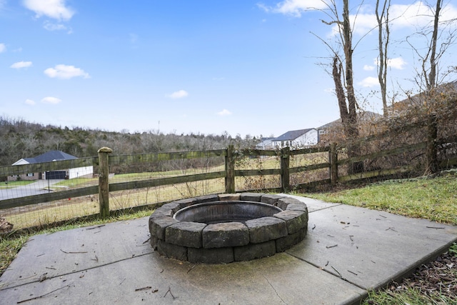 view of patio with an outdoor fire pit