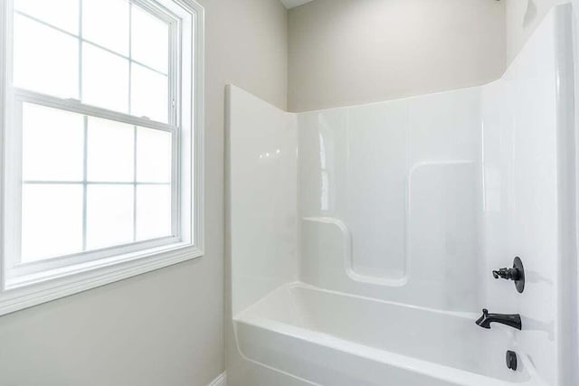 bathroom with shower / bathtub combination