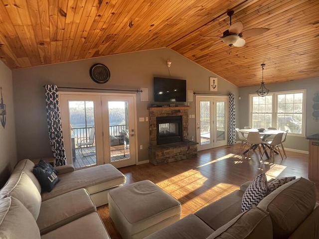 living room with lofted ceiling, wood-type flooring, wooden ceiling, and ceiling fan