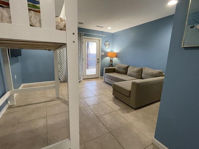 living room featuring tile patterned flooring