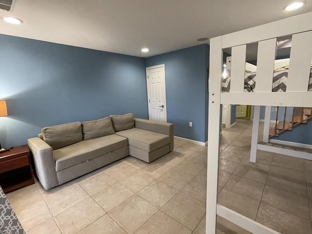 living room featuring tile patterned flooring