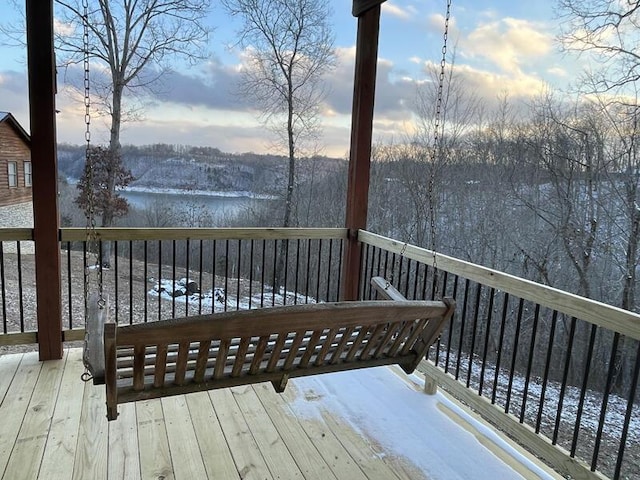 deck at dusk with a water view