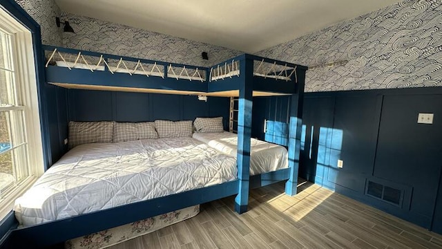 bedroom featuring hardwood / wood-style floors