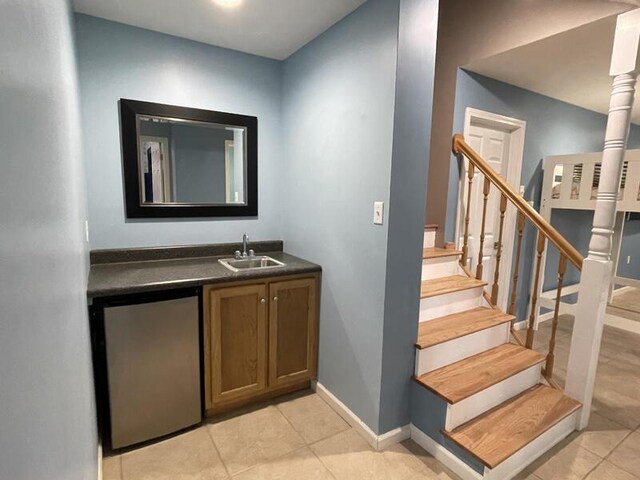 bathroom with vanity and tile patterned flooring