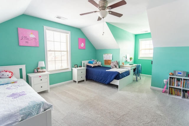 bedroom with ceiling fan, lofted ceiling, and light colored carpet