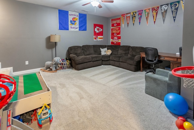 carpeted living room featuring ceiling fan