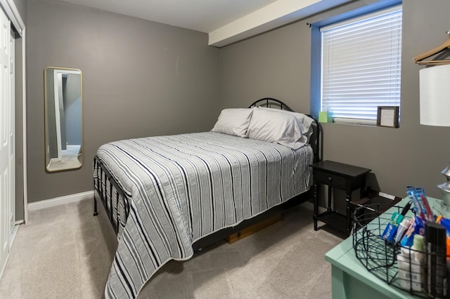 bedroom featuring carpet