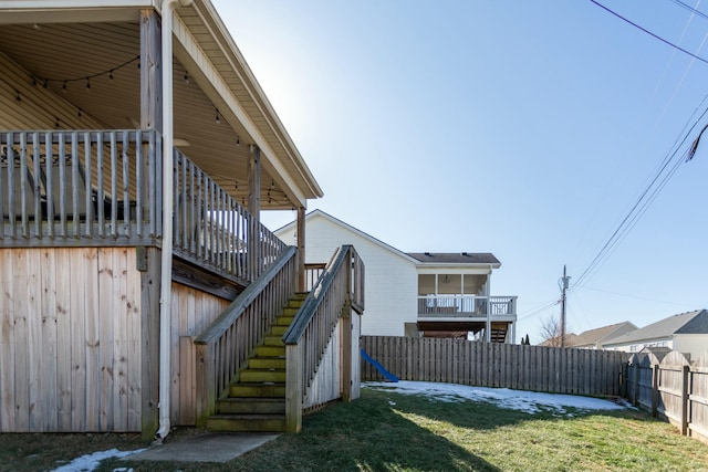 view of property exterior featuring a lawn