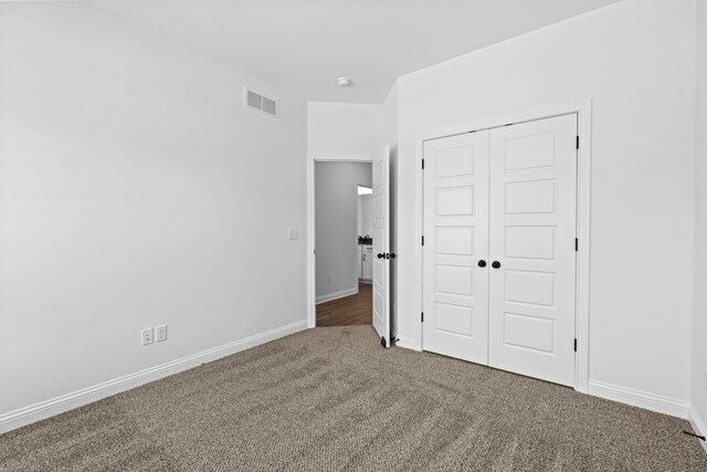 clothes washing area with washer hookup, hookup for an electric dryer, and wood-type flooring