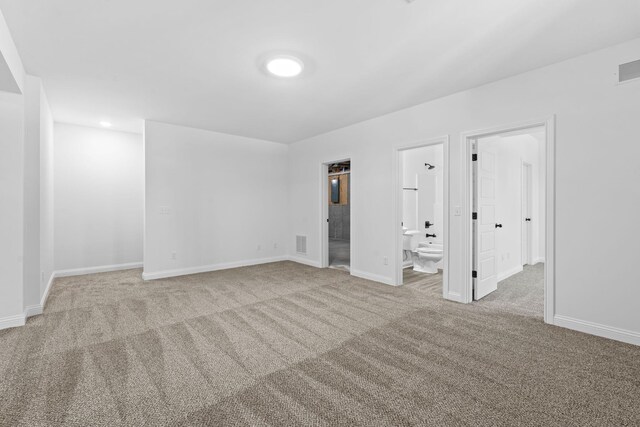 empty room with carpet floors