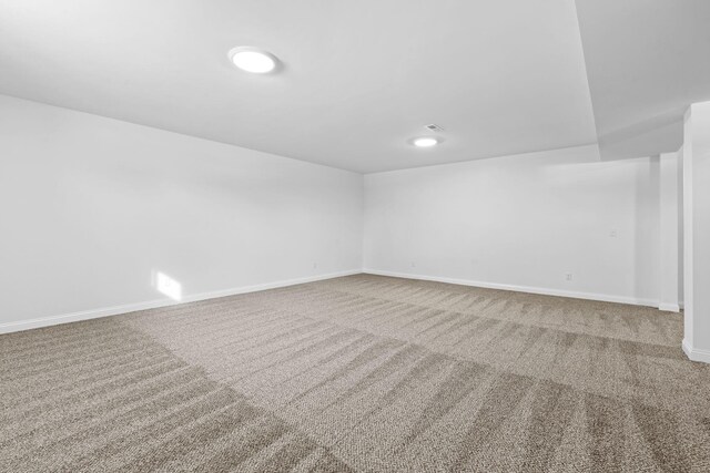 basement with carpet flooring