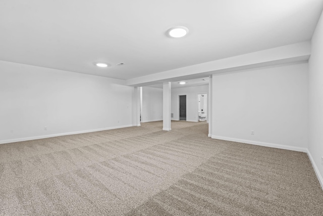 finished basement with carpet floors, recessed lighting, and baseboards