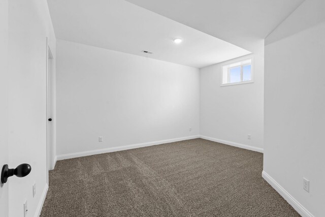 unfurnished room with carpet