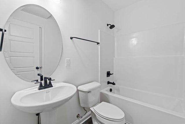 full bathroom featuring shower / tub combination, a sink, and toilet