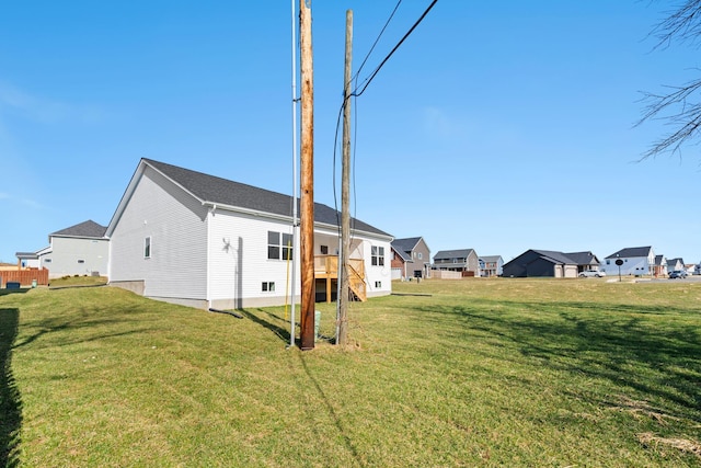 view of yard featuring a residential view