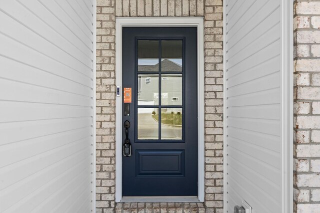 hall with dark wood-type flooring