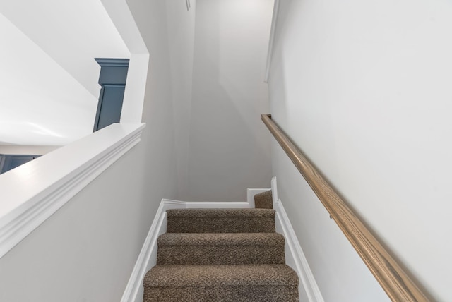 stairway with baseboards