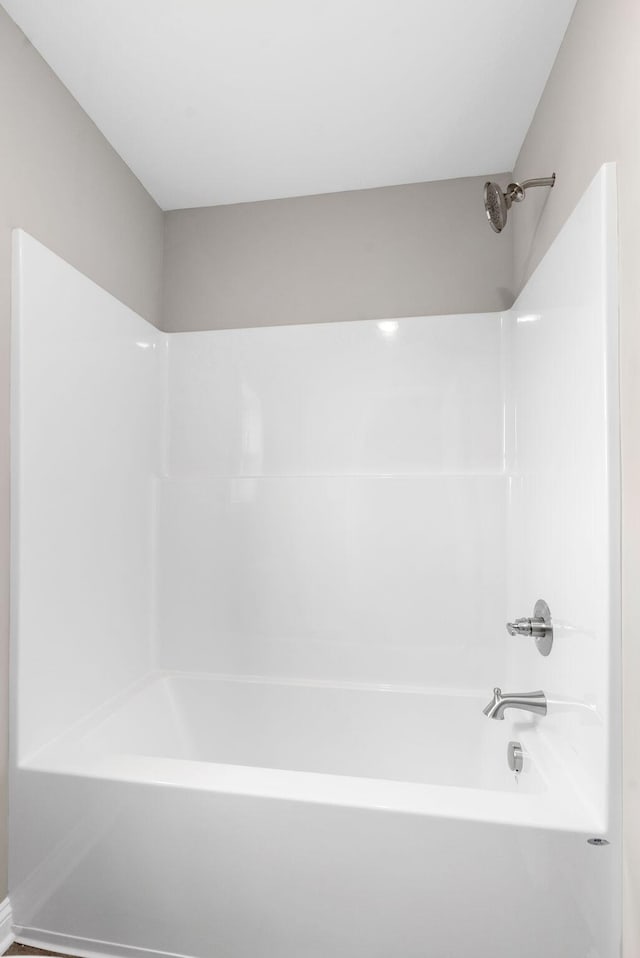 full bath featuring washtub / shower combination