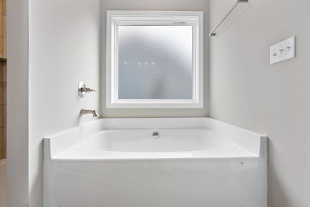 full bath featuring a bathing tub