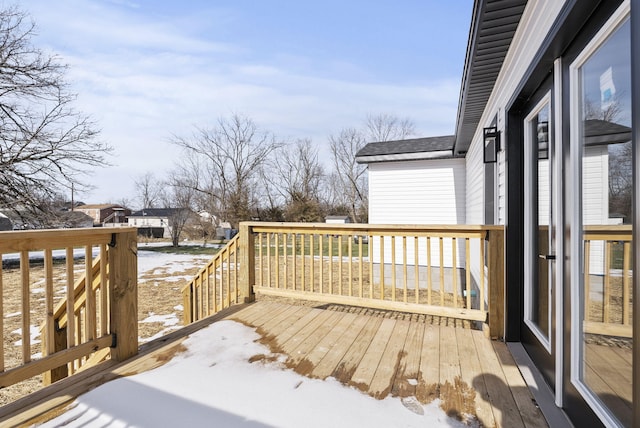 view of snow covered deck