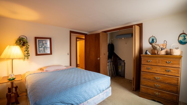 carpeted bedroom with a closet