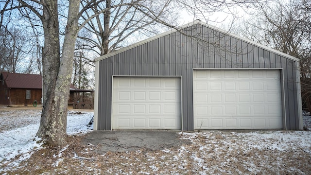 view of snow covered garage