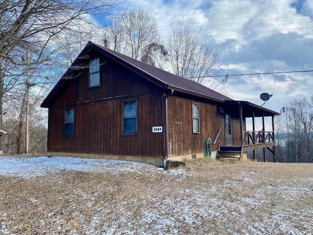 view of snow covered property